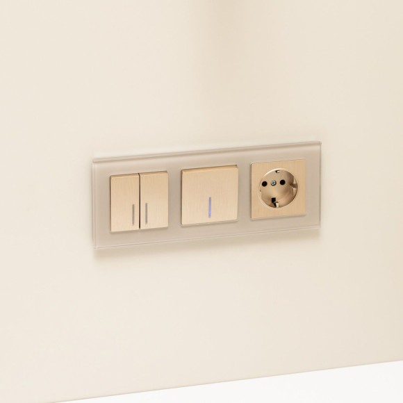 Выключатель двухклавишный проходной с подсветкой (шампань рифленый) W1122110 Выключатель двухклавишный проходной с подсветкой (шампань рифленый) W1122110